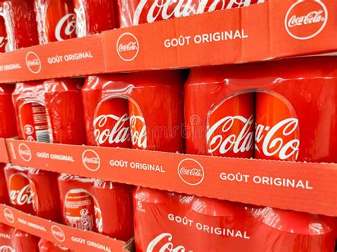 Coca Cola Brand Soft Drink On Display For Sell At A Supermarket Shelf