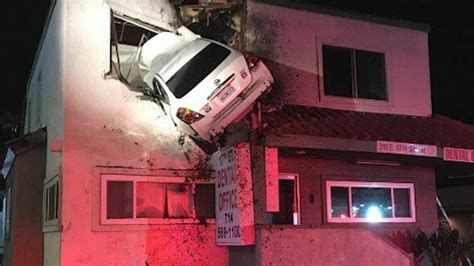 Moment Car Crashes Into Second Story Office Cnn