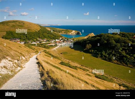 View Of Lulworth Village And Lulworth Cove On Jurassic Coast In