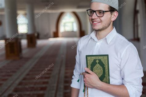 Muslim Man Reading Quran Stock Photo By Myvisuals