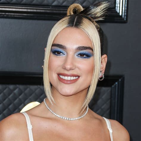 Dua Lipa Puts Her Toned Body On Display In A Itty Bitty String Bikini