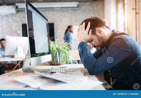 Portrait Of Overworked Employee In Modern Office Stock Image Image Of