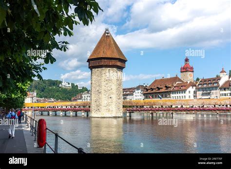 Town Hall Clock Tower And The Kapellbr Cke Chapel Bridge Across River