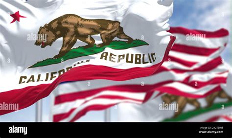 Two California State Flags Flying Along With The National Flag Of The United States Of America