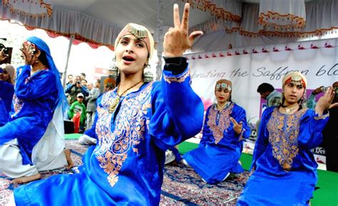 Kashmiri girls perform folk dance during Saffron Festival