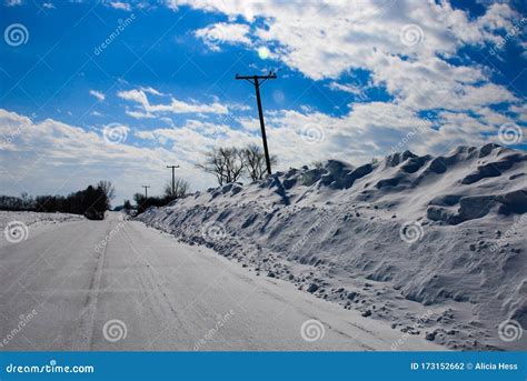 Tall Snow Drifts Along A Road Stock Photo Image Of Partway Snowy