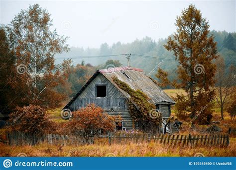 Old Abandoned Rickety Old Wooden House Without Windows With A Partially