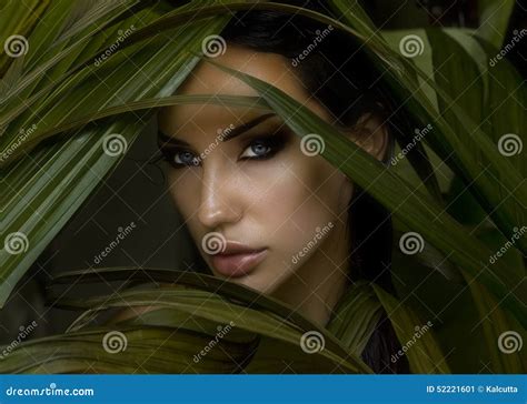 Beautiful Woman Hiding Behind The Palm Leaves Stock Image Image Of