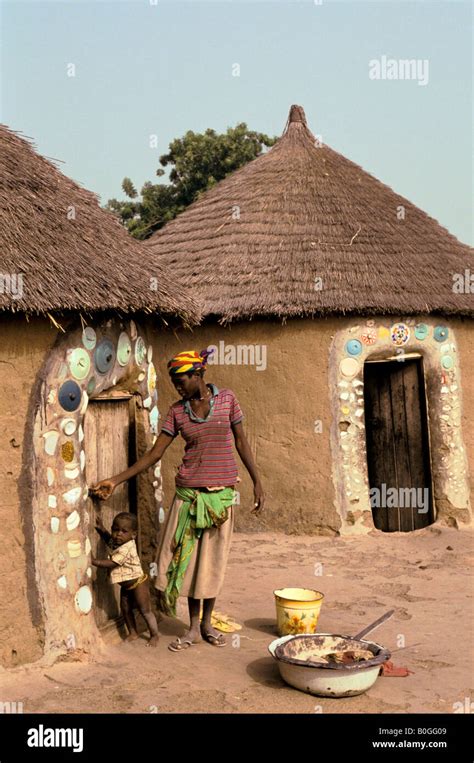 A Mother And Child Outside A Mud Hut In Mamprusi Compound Janga Ghana