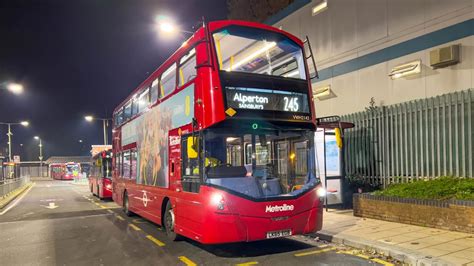 London S Buses In Golders Green Bus Station At Night With Some