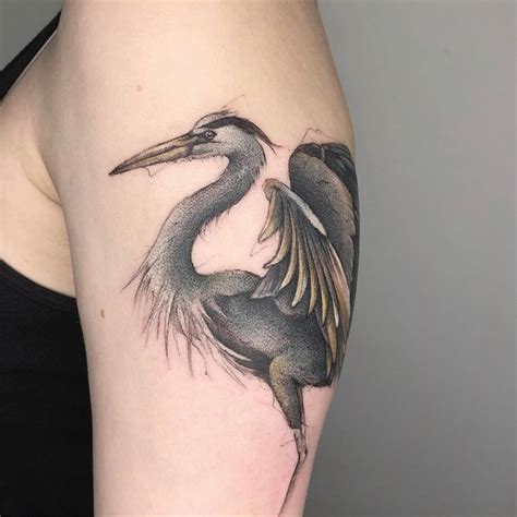 Heron Tattoo On The Upper Arm