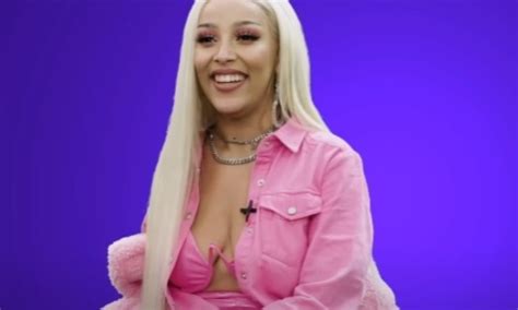 Doja Cat Shows Off A Slinky Bikini While Making Out With Musician Boyf