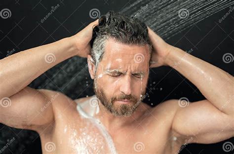 Man Washing Hair In Bathroom Guy Bathing Shower Head In Bathtub Male