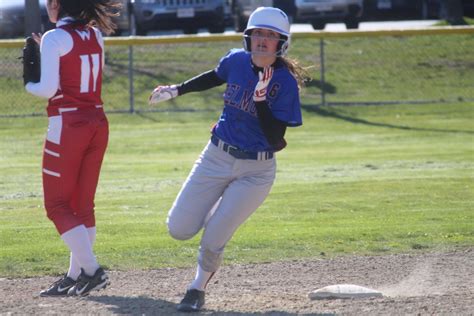 Sports: Bats Come Alive As Belmont Softball Wins Season Opener