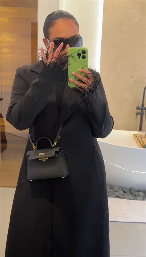 JC In An All Black Sophisticated Jet Set Babe Look Slaylebrity