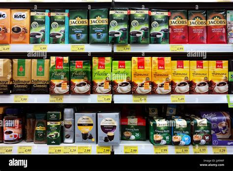 Shelves With An Assortment Of Coffee Packings In A Supermarket Stock