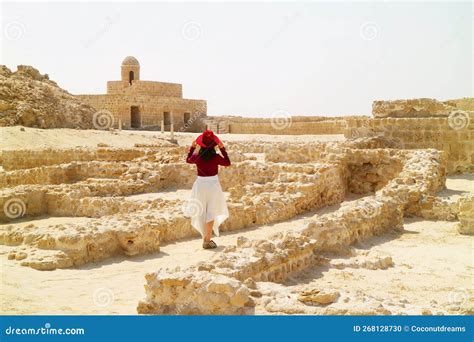 Female Visiting The Bahrain Fort The Ancient Harbour And Capital Of