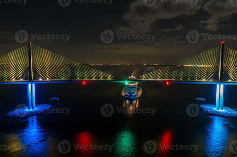 Drone Panorama Of Sunshine Skyway Bridge Over Tampa Bay With Passing