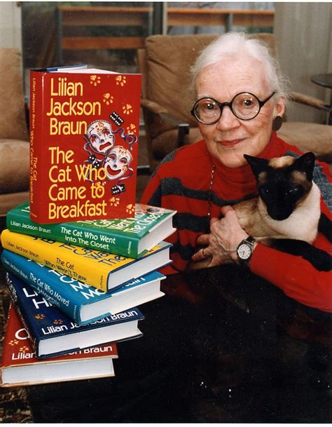 Lillian Jackson Braun with her Siamese cat. Her light, but fun, series