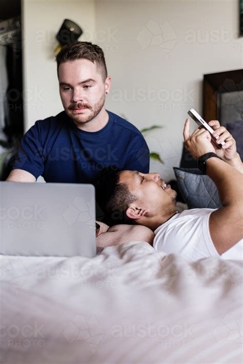 Image Of Gay Couple Hanging Out At Home Austockphoto