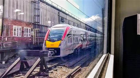 Departing Cambridge North And Passing The New Greater Anglia Class 755