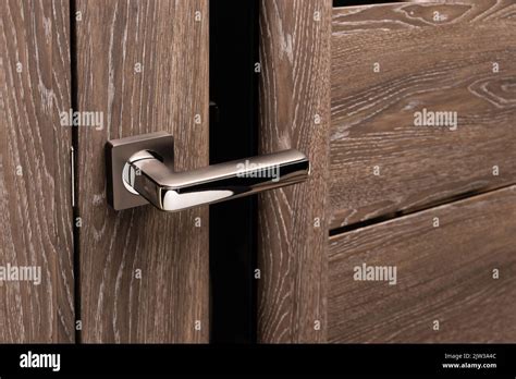 Close Up Of Steel Door Handle On Brown Wooden Door Dark Oak Door With