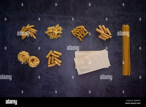 Different Types Of Pasta Including Penne Fusilli Farfalle Spaghetti