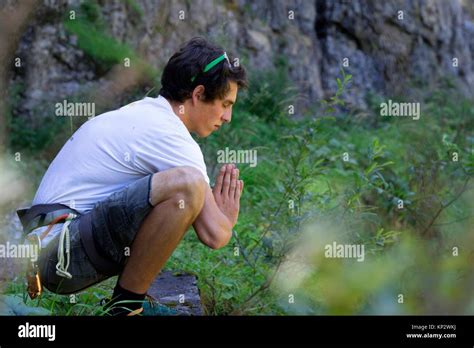Praying in nature hi-res stock photography and images - Alamy