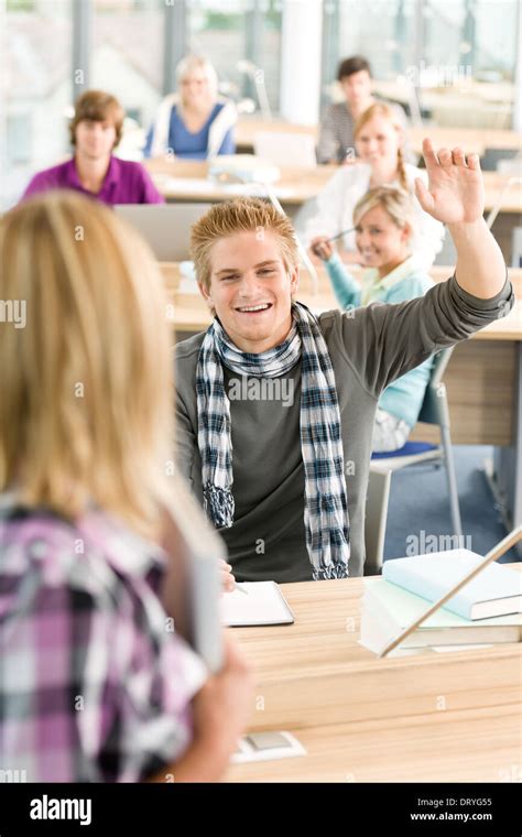 High School Student Raising Hands Stock Photo Alamy