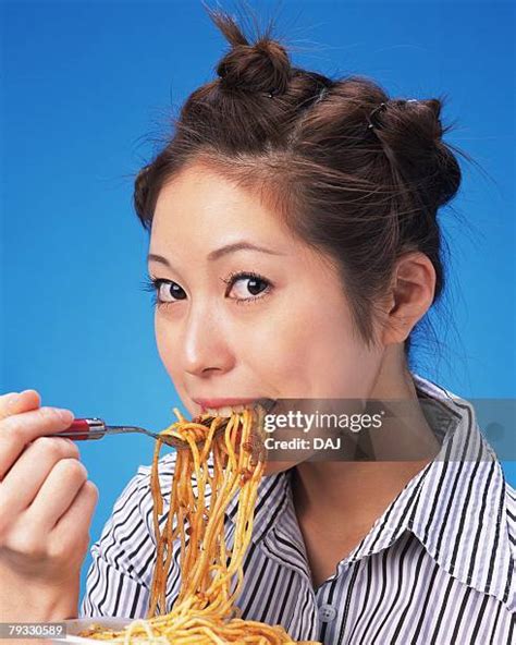 Eating Spaghetti Color Background Photos And Premium High Res Pictures