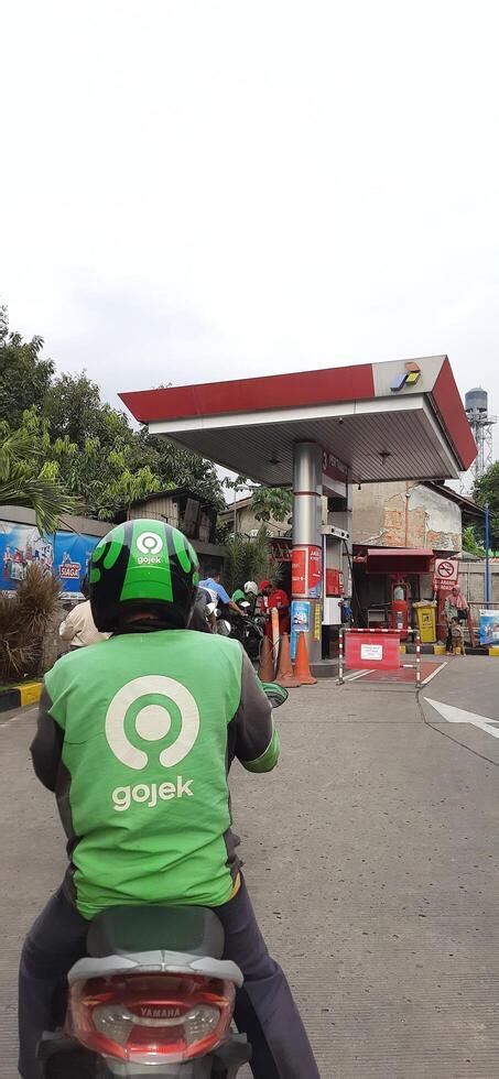 Queue Of Vehicles Public Refueling At Pertamina Gas Station Or Pom