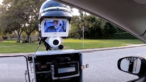 This Police Robot Pulls a Car Over Just Like a Real Officer