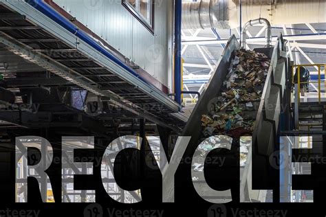 capital letters recycle on moving conveyor transporter on Modern waste