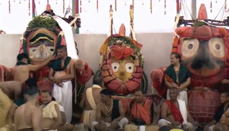 Braving Rain Thousands Witness Bathing Ritual Of Lords At Puri