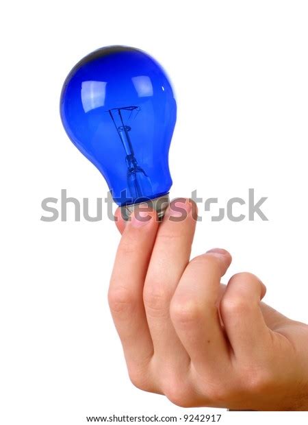 Man Holding Lamp On Light Background Stock Photo Edit Now 9242917