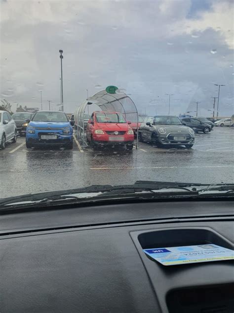 Motorist Spotted Parking Car Inside Asda Trolley Shelter