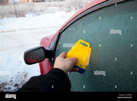 Frozen car window during winter morning Stock Photo - Alamy