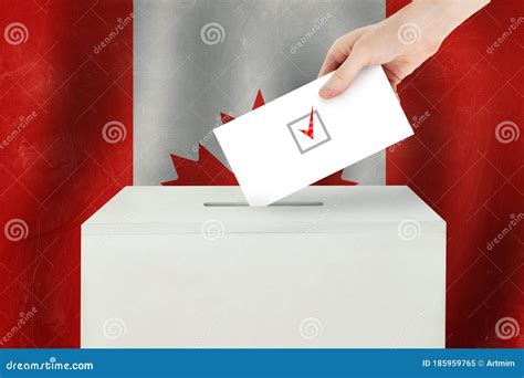 Canadian Vote Concept Voter Hand Holding Ballot Paper For Election