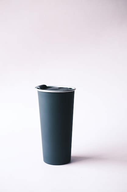 Premium Photo Black Color Reusable Eco Coffee Cup On Table With Copy