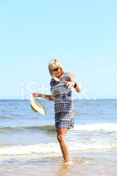 Mature Woman On Beach Summer Holiday Stock Photo Royalty Free