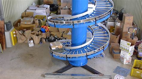 Nexus Gravity Roller Spiral Conveyor Carton Handling Youtube