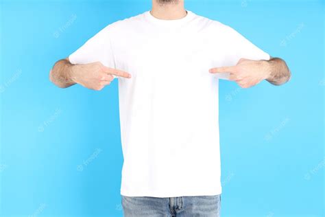 Premium Photo Man In Blank White T Shirt On Blue Background