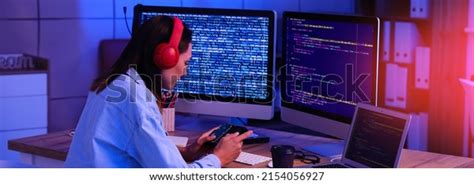 Young Female Programmer Working Office Night Stock Photo 2154056927