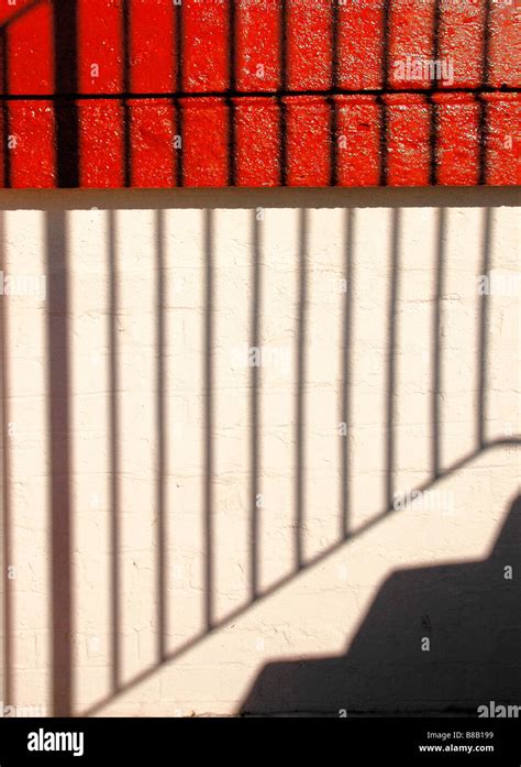 Shadow Of Steps And Railings Against A Building Wall Stock Photo Alamy