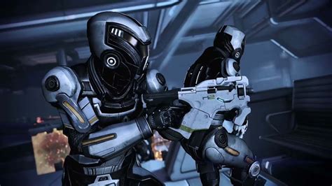 Download Intense Combat In A Mass Effect Cerberus Mission Wallpaper