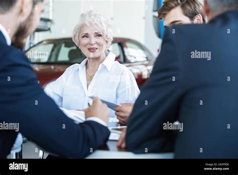 Confident Mature Business Woman Leader Coach Speaking At Meeting