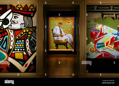 A Painting Of Ll Cool J Center By Kehinde Wiley Is Seen In A Gallery