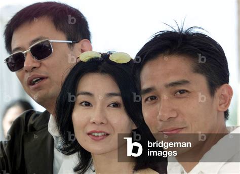 Image Of Chinese Director Wong Kar Wai L Stands With Actress Maggie