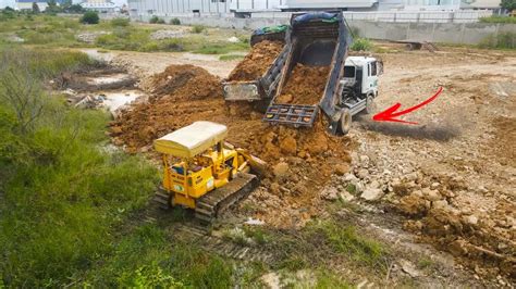 Fantastic Dozer Spreading Rock In To Water With Incredible Dump Truck