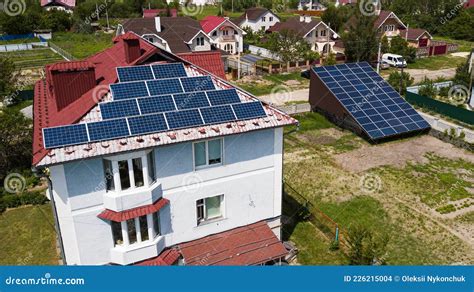 Solar Panels Placed On The Roof Of A Residential Country House Stock